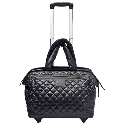 chanel luggage travel bag|Chanel travel bag with wheels.